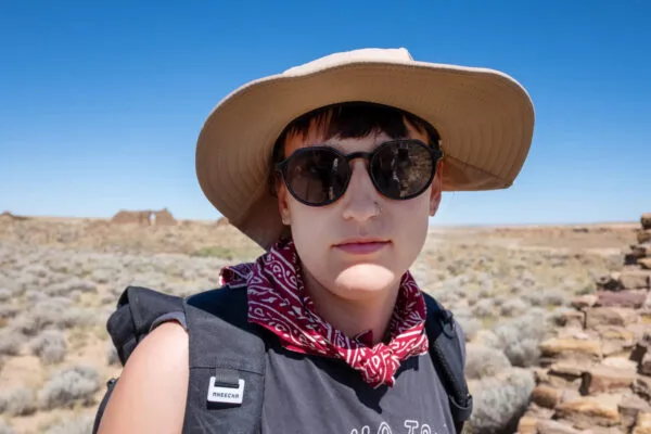 Viola Bordon, Artist with wide-brimmed hat and sunglasses at Chaco Canyon